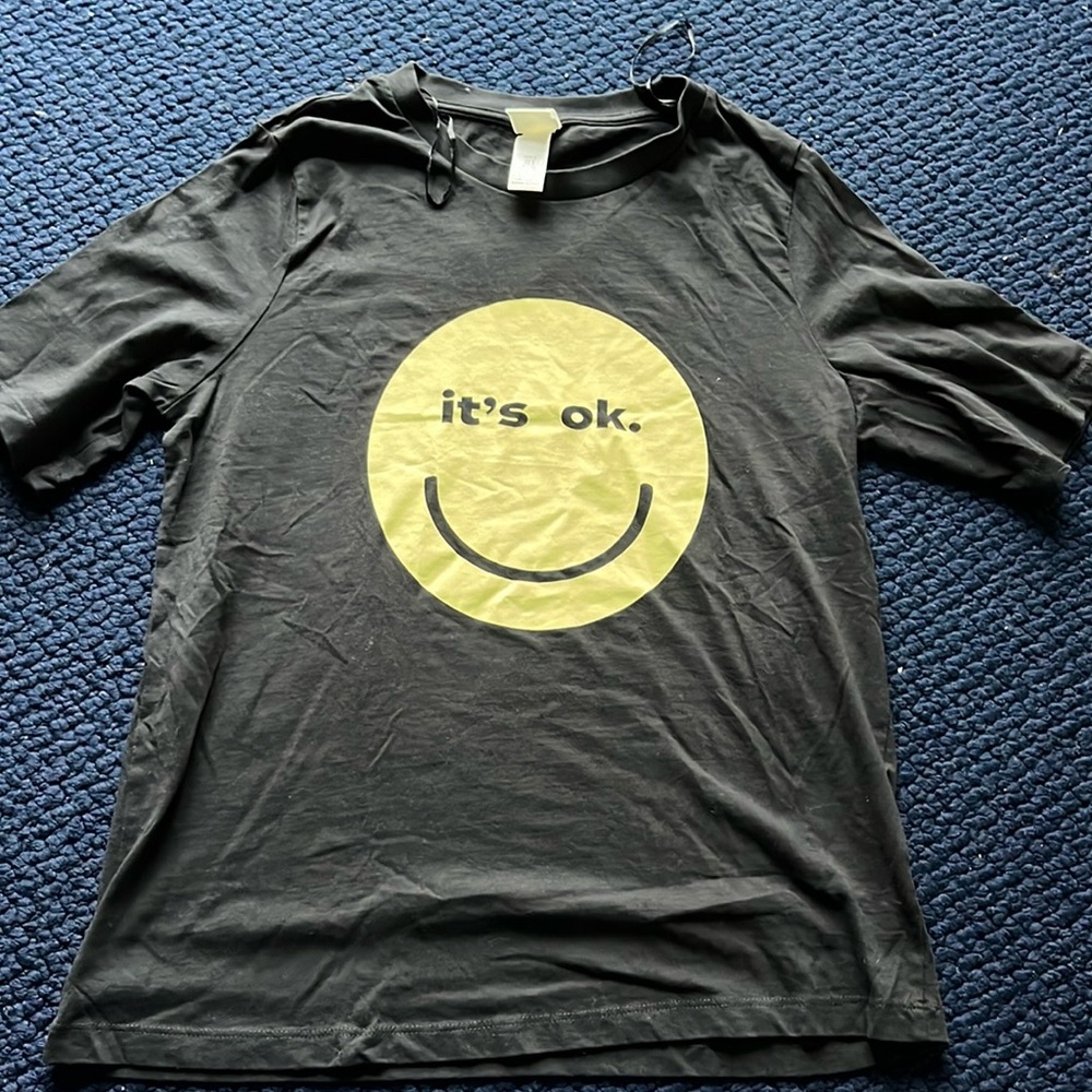 H&M women’s TSHIRT size small black smiley face. Great Condition
